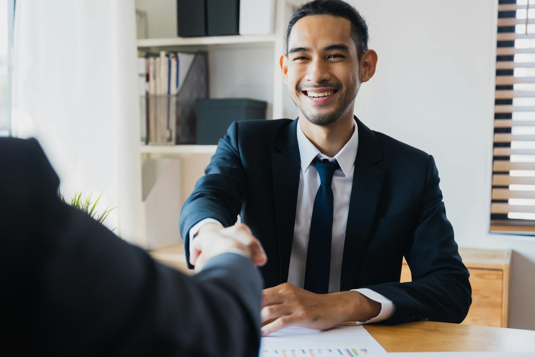 Professional handshake representing successful business partnerships